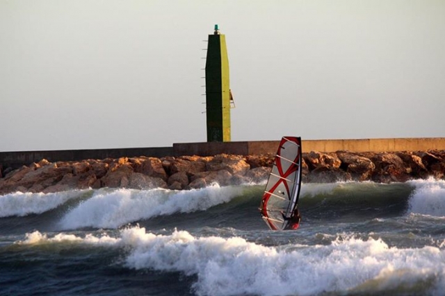  With the lighthouse in the background 